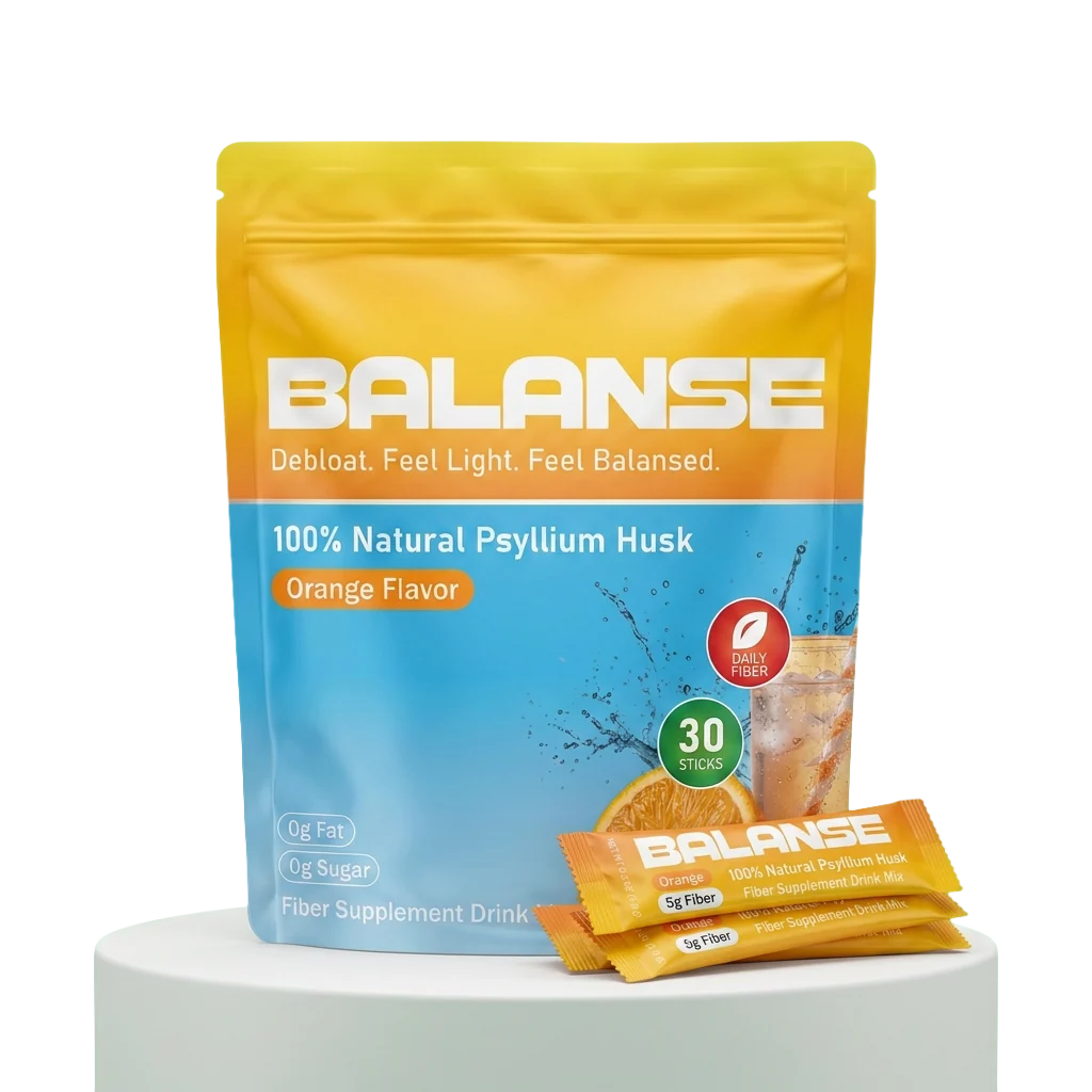 Balanse Daily Fiber pouch and orange stick pouring into a glass of water
